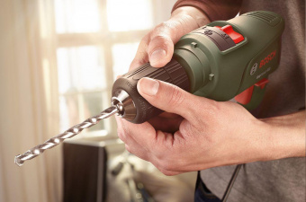 Дрель ударная Bosch EasyImpact 600 600Вт патрон:быстрозажимной реверс (кейс в комплекте) (0603133020) от магазина РЭССИ