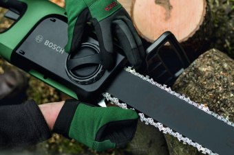 Электрическая цепная пила Bosch UniversalChain 40 1800Вт дл.шины:16" (40cm) (06008B8400) от магазина РЭССИ