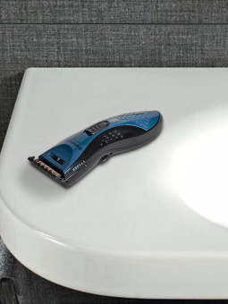 Машинка для стрижки Endever Sven 972 черный/синий 3Вт (насадок в компл:1шт) от магазина РЭССИ