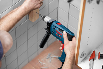 Дрель ударная Bosch GSB 13 RE 600Вт патрон:быстрозажимной реверс (кейс в комплекте) (0601217104) от магазина РЭССИ