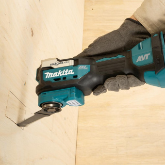 Многофункциональный инструмент Makita DTM52RTJX1 синий/черный от магазина РЭССИ