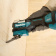 Картинка Многофункциональный инструмент Makita DTM52RTJX1 синий/черный от магазина РЭССИ Многофункциональный инструмент Makita DTM52RTJX1 синий/черный от магазина РЭССИ
